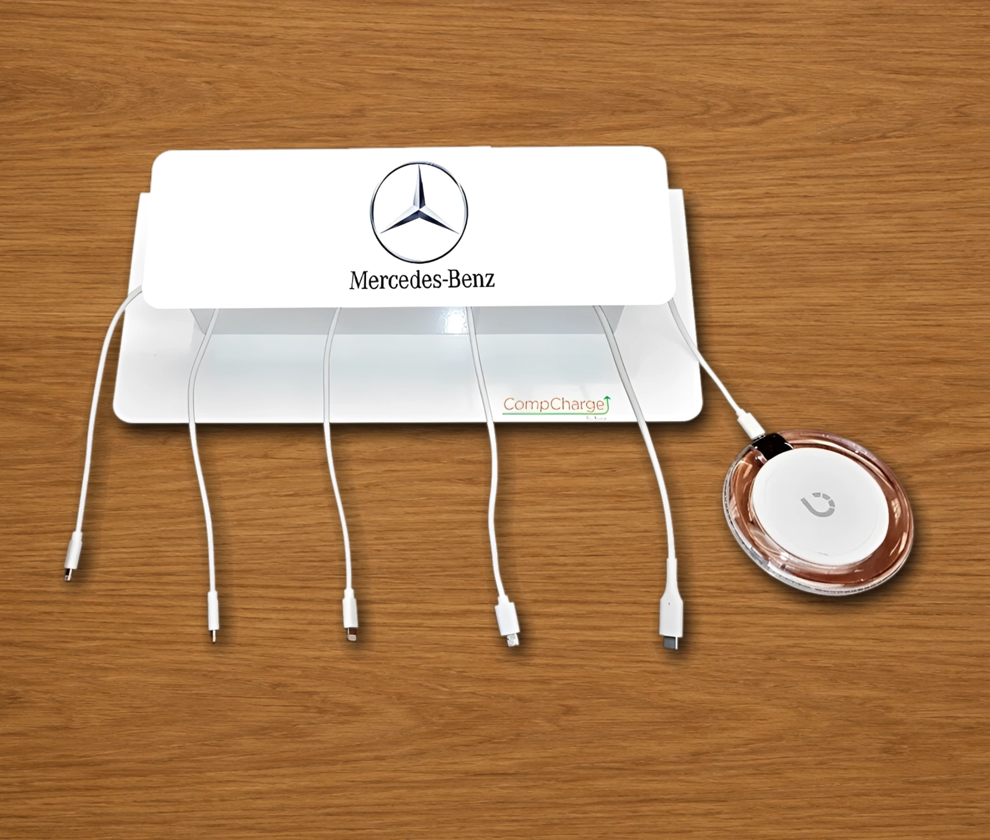 Multi-device charging station on wooden surface.
