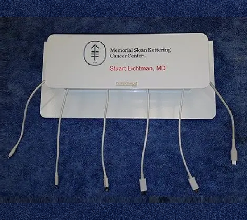 Medical device with multiple cables on display.